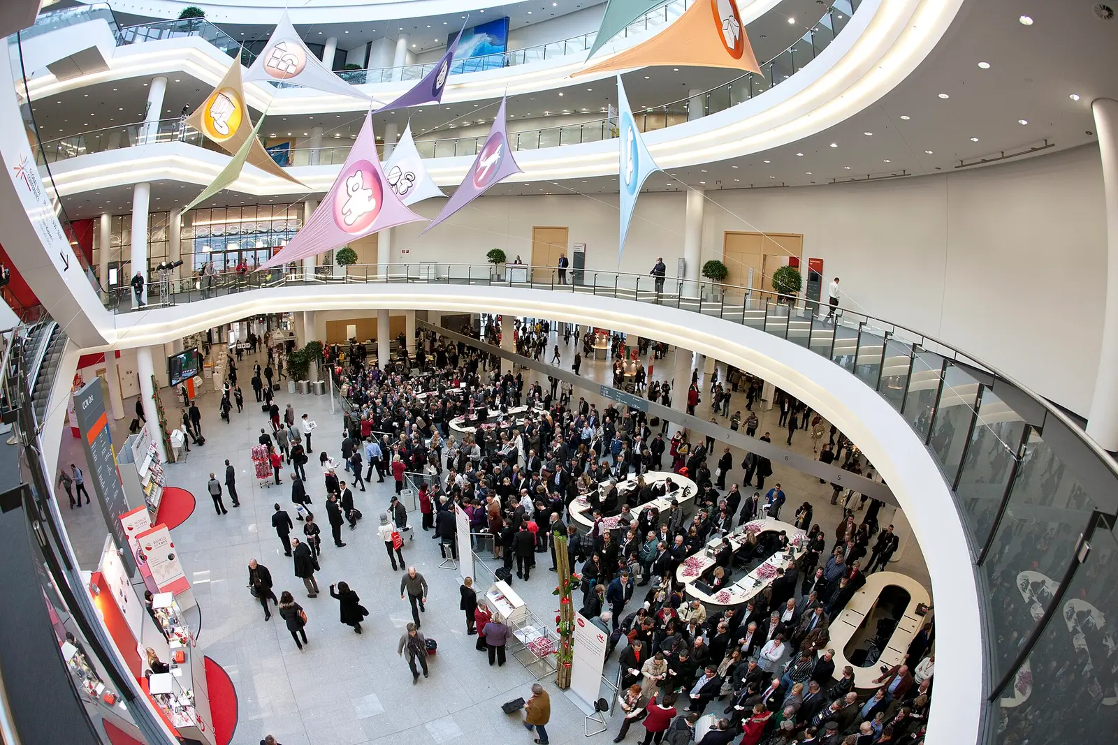 Visitors gathered in the curved atrium of the Nuremberg exhibition centre during the Spielwarenmesse toy fair